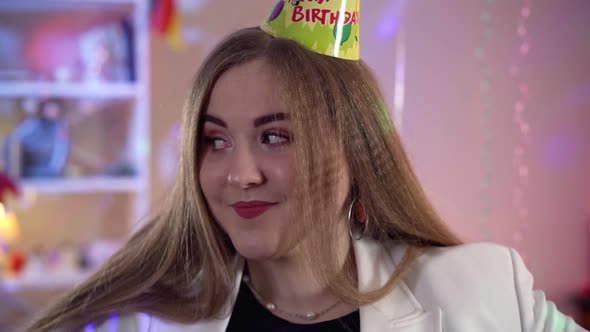 Closeup Headshot of Charming Cheerful Young Woman Looking Around at Decorated House Smiling and