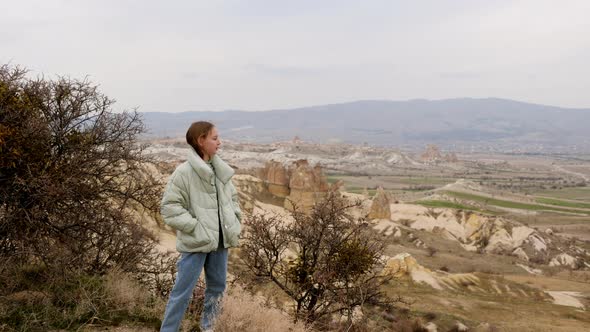 Teen Girl Standing on Mountain Edge Rose Valley Landscape