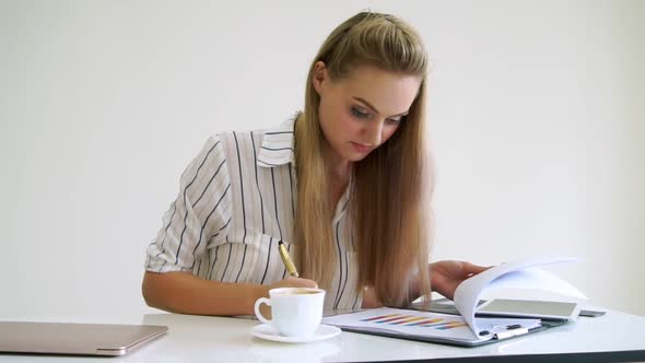 Blonde Business Woman Working at Modern Office