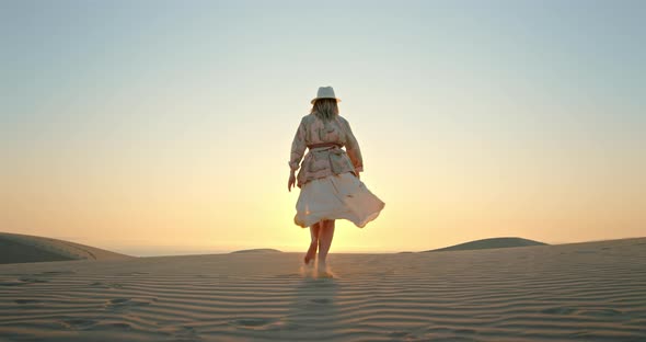 Woman Running Toward the Sunset By Scenic Desert Nature Landscape  Slow Motion