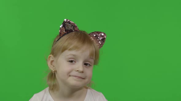 Girl in Headband with a Cat Ears Shows Emotion of Dissatisfied. Chroma Key