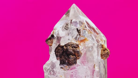 Mountain Quartz Crystal Isolated on Pink Background