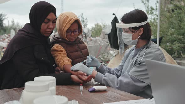 Little Girl Gets Vaccinated at Refugee Camp