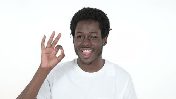 Okay Sign By African Man, White Background