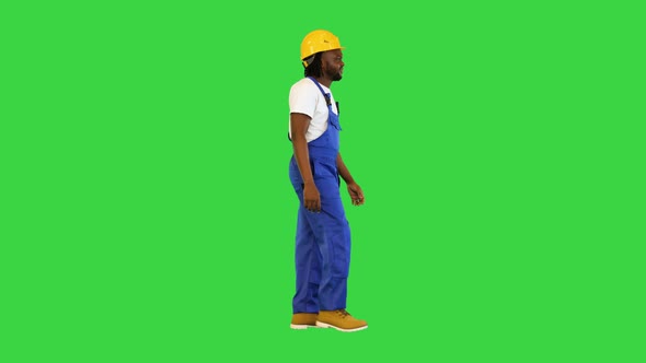 Walking African American Construction Worker on a Green Screen Chroma Key