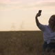Cute Young Woman Taking a Selfie in the Field - VideoHive Item for Sale