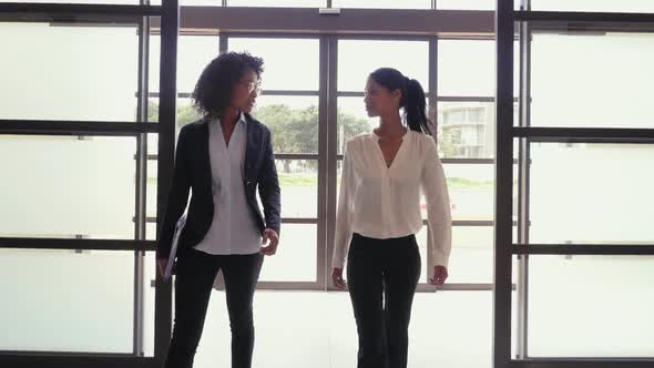 Women in office lobby