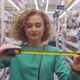 Young Woman Choose Measure Tape in Diy Store - VideoHive Item for Sale