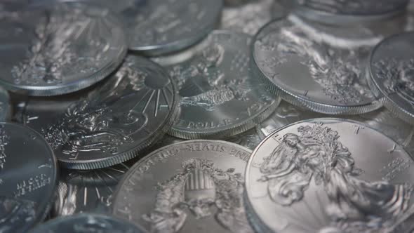 ECU Silver coins (American Silver Eagles) spinning right