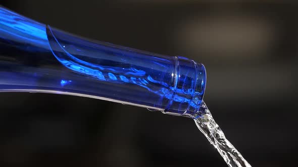 Water Pouring From a glass Bottle