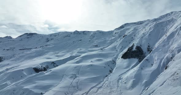 Aerial view of beautiful snowy mountains in Gudauri, Georgia