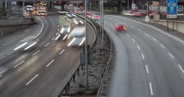 Timelapse of busy city highway in 4k, cars moving on 6 lane motorway