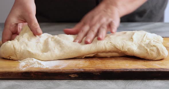 Kneading and folding dough