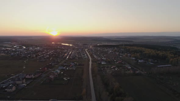 Aerial view of autumn village, evening, sunset 02