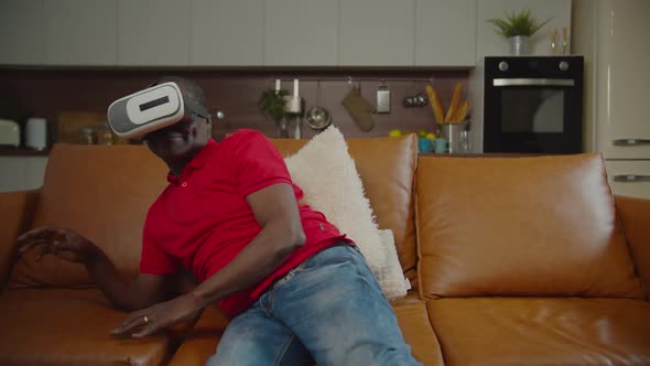 Elderly Black Male in Headset Playing Vr Game Indoor