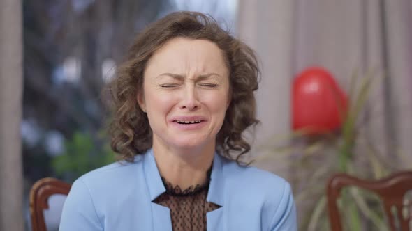 Closeup Portrait of Sad Beautiful Slim Adult Woman Alone on Valentine's Day Crying