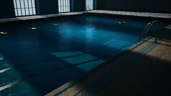 The View of an Empty Public Swimming Pool Indoors alt