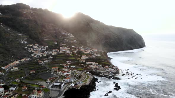 Flying Forwards over Porto Moniz Town, Madeira Island, Portugal