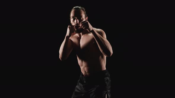 Muscular Man Practicing Shadow Boxing