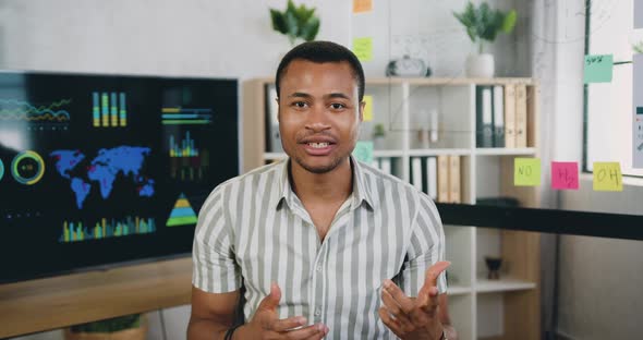 African American Office Manager which Recording Video for Internet Spectators with Thumbs up