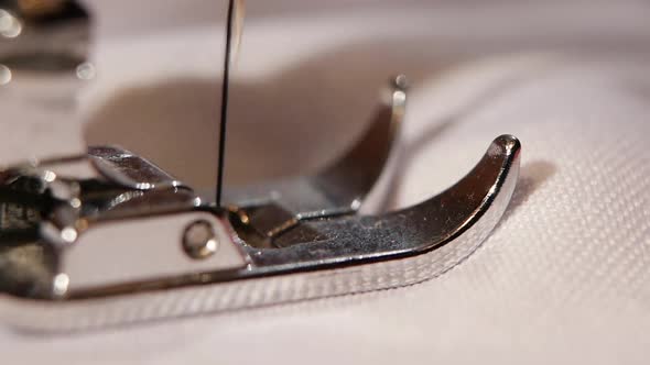 Needle on the Sewing Machine. Slow Motion