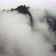 Aerial drone view of the deep forest from above with passing clouds. - VideoHive Item for Sale
