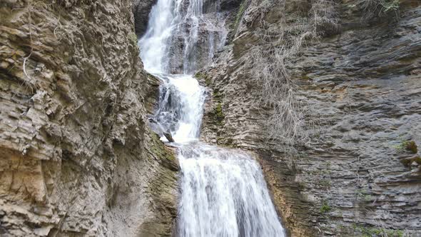 Margaret Falls flowing down a rocky mountain cliff in the scenic and popular Herald Provincial Park