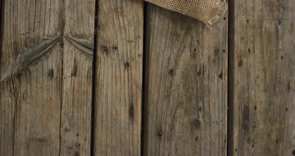 Video of rosemary twig and spoon of salt on wooden background