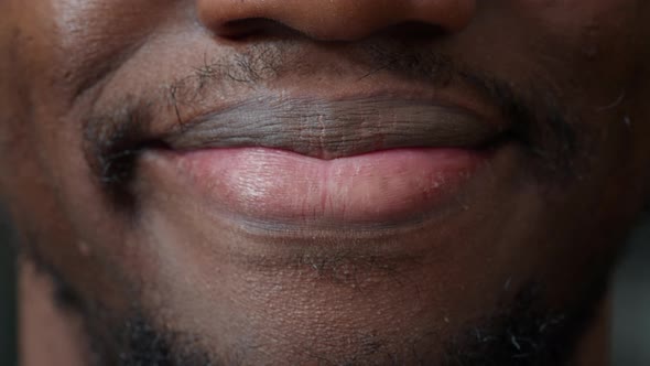 Macro Shot of Young Man Smiling in Front of Camera