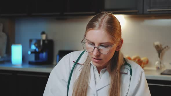 Close-up of Female Doctor Looking To the Camera and Making Video Call To Patient.