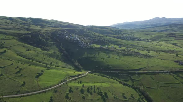 Aerial View Of Village Green Meadows And Hills