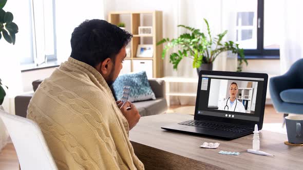 Sick Man Thermometer Having Video Call on Laptop