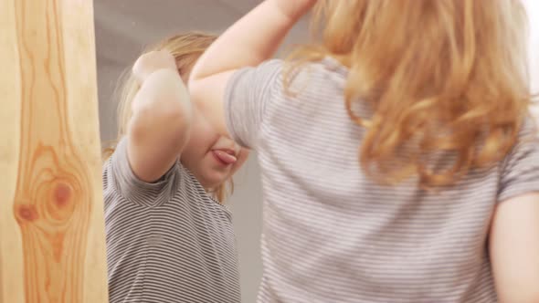 Little Sweet Girl Flaunts Herself Near Mirror Poses Examines Herself Squirms