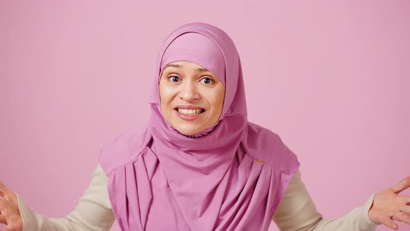 Emotional Puzzled Islamic Woman Feeling Annoyed and and Asking What I Don't Understand to Camera