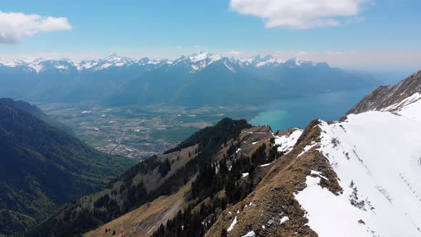 Aerial Drone View on Snowy Peaks of Swiss Alps. Switzerland. Rochers-de-Naye Mountain Peak