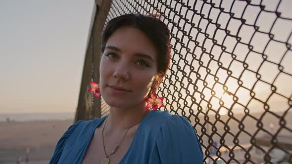 Dreamy Young Woman Enjoys Sweet Sunset Evening