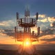 Flying up Close to Telecommunications Cellular Tower against Scenic Sunset - VideoHive Item for Sale