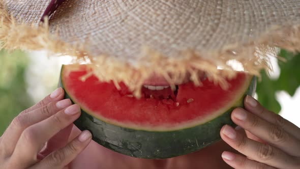 Closeup Caucasian Woman in Straw Hat Eating Tasty Juicy Watermelon in Slow Motion