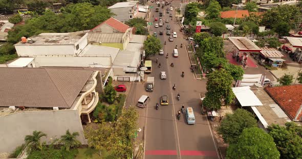 Aerial Drone Flight top down View of busy city rush hour heavy traffic jam highway. Aerial view of t