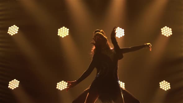 Incendiary Rumba Performed By Male and Female Partners in Ballroom Dancing