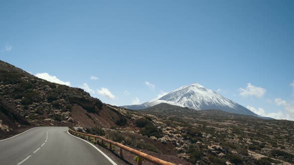 Driving a Car in Teide National Park, Tenerife, Canary Islands, Spain. Volcanic Rocky Desert