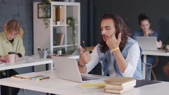 Young Businessman Talking on Video Call