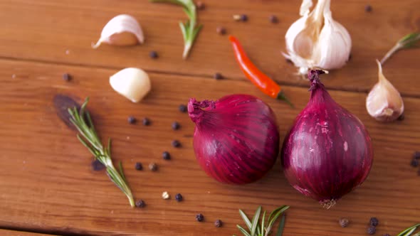 Onion, Garlic, Chili Pepper and Rosemary on Table 29