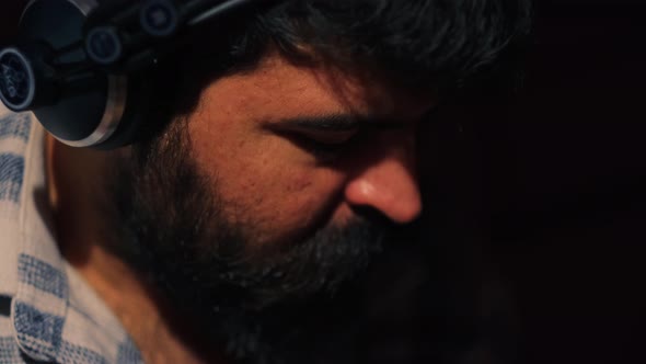 Man Playing Instrument in Studio