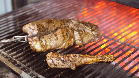 Chef Prepares Beef Steak Slow Motion. Puts Meat in Grill Charcoal Oven. Cooking Process on Barbecue