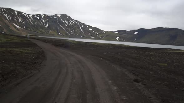 Offroad Car Vehicle Drive on Dirt Road to Landmanalaugar on Highlands Iceland