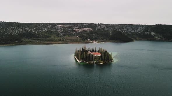 Flying towards the visovac monastery island in Croatia.