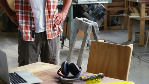 Carpenter fixing the camera