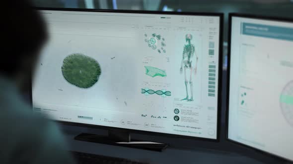 Biology Scientist Inspects Microscopic Division Of Microbe Inside Human Organism alt