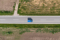 Top view of old blue van on highway through countryside - PhotoDune Item for Sale